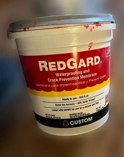 U will have a 1/2 unfinished drywall edge bump. . Redgard over joint compound